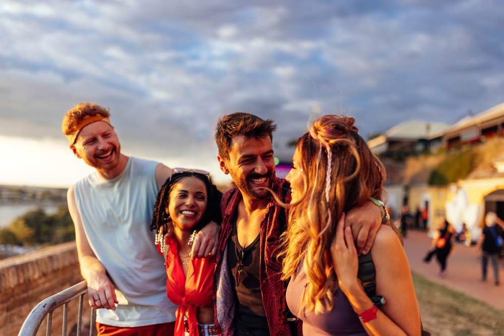 A,Group,Of,Young,Friends,Are,At,A,Music,Festival