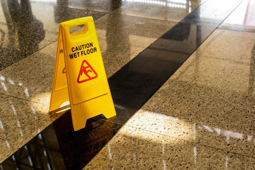 Wet floor warning sign in a commercial building